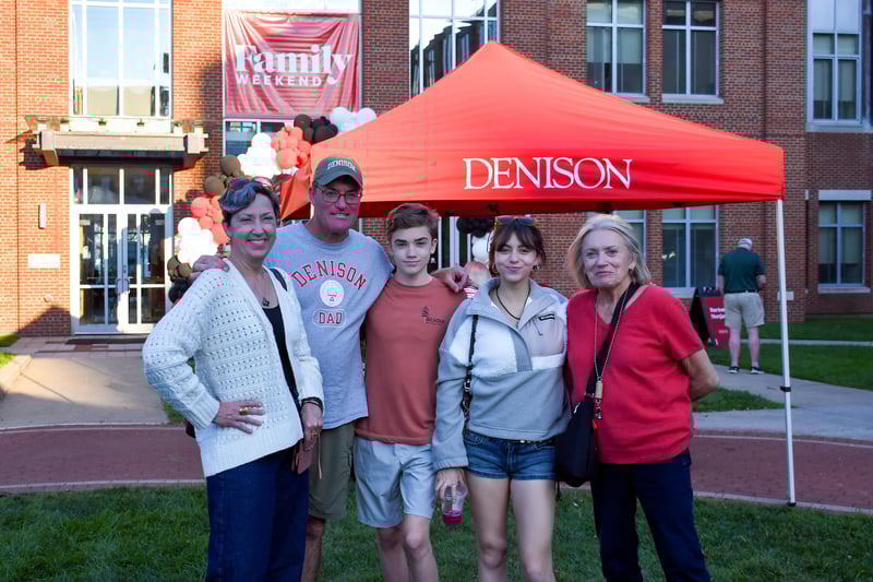 A photo of a Denison family standing on Reese~Shackelford Common during Family Weekend 2025.