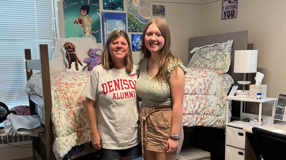 A photo of Michele and Kate Hoehn inside Crawford Hall.
